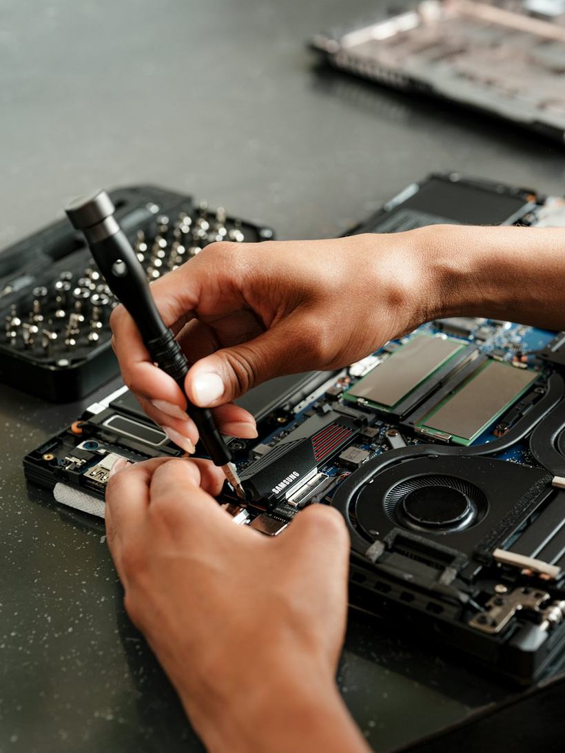 RadioActive technician repairing a laptop in Kalispell